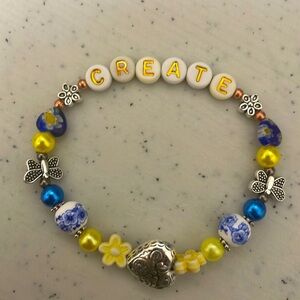 Create bracelet in yellow and blue
